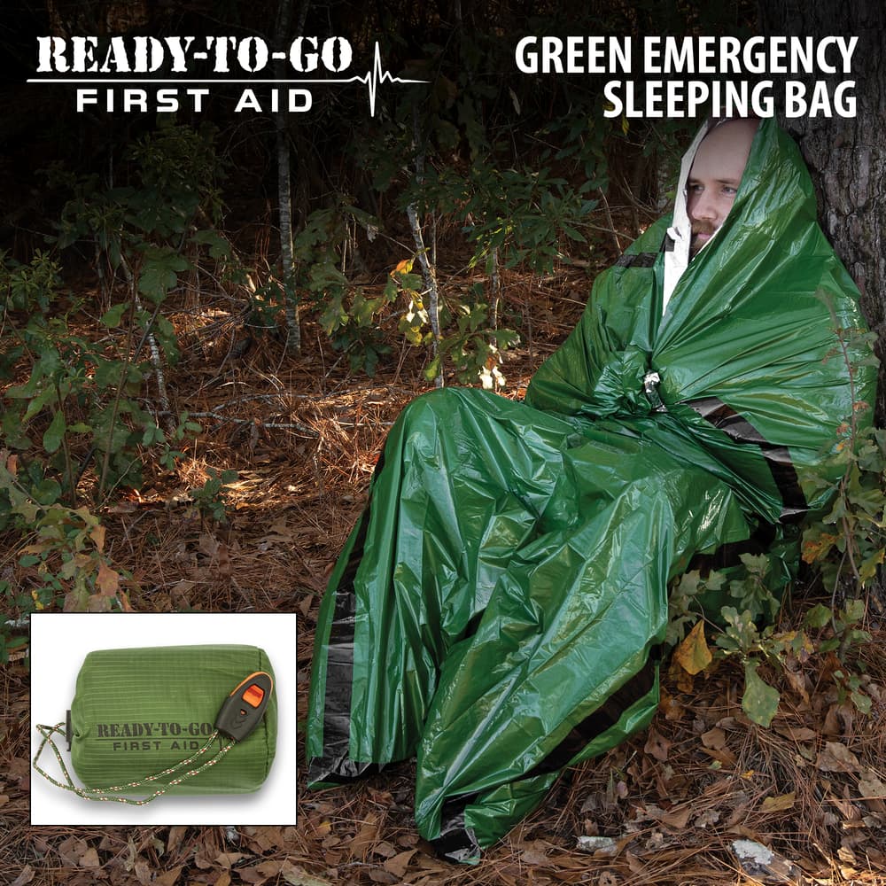 Full image of a person in the Ready-To-Go Green Emergency Sleeping Bag. image number 0